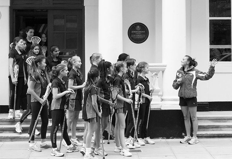 Black and white photo of girls in pe class