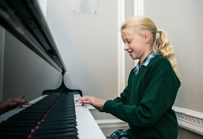 Girl playing piano